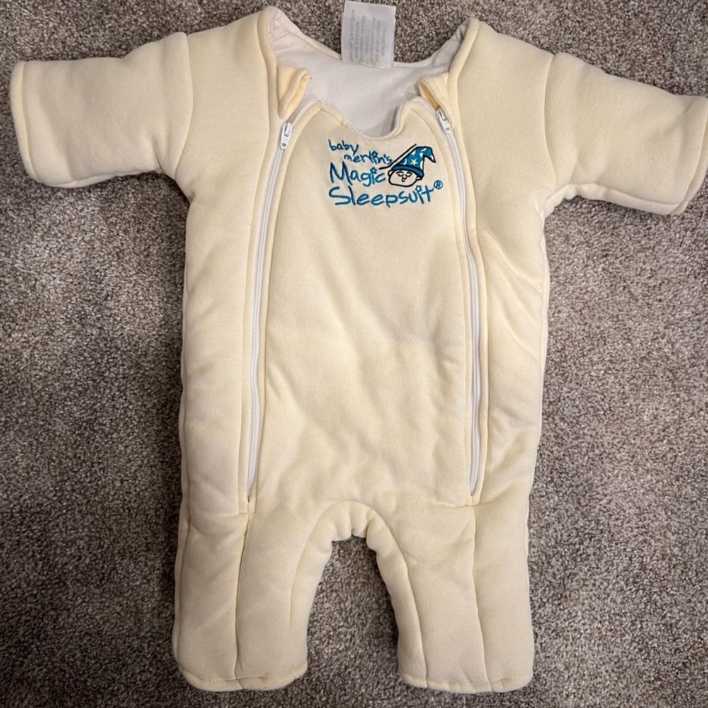 Used one time- Merlin Sleep Suit size small (3-6 months, 12-18 lbs)